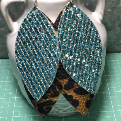 Teal Glittered And Cheetah Print Faux Leather..